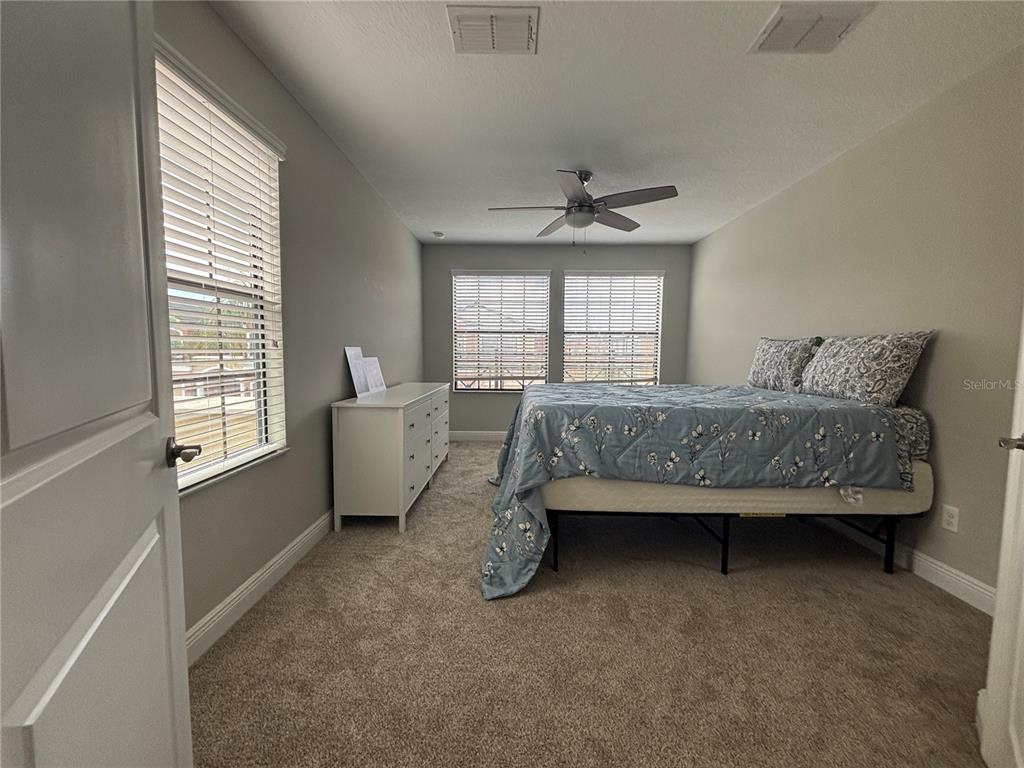 9136 Fox Sparrow Road Tampa, FL 33626 - Photo 29 of 34 a living room with furniture and a window