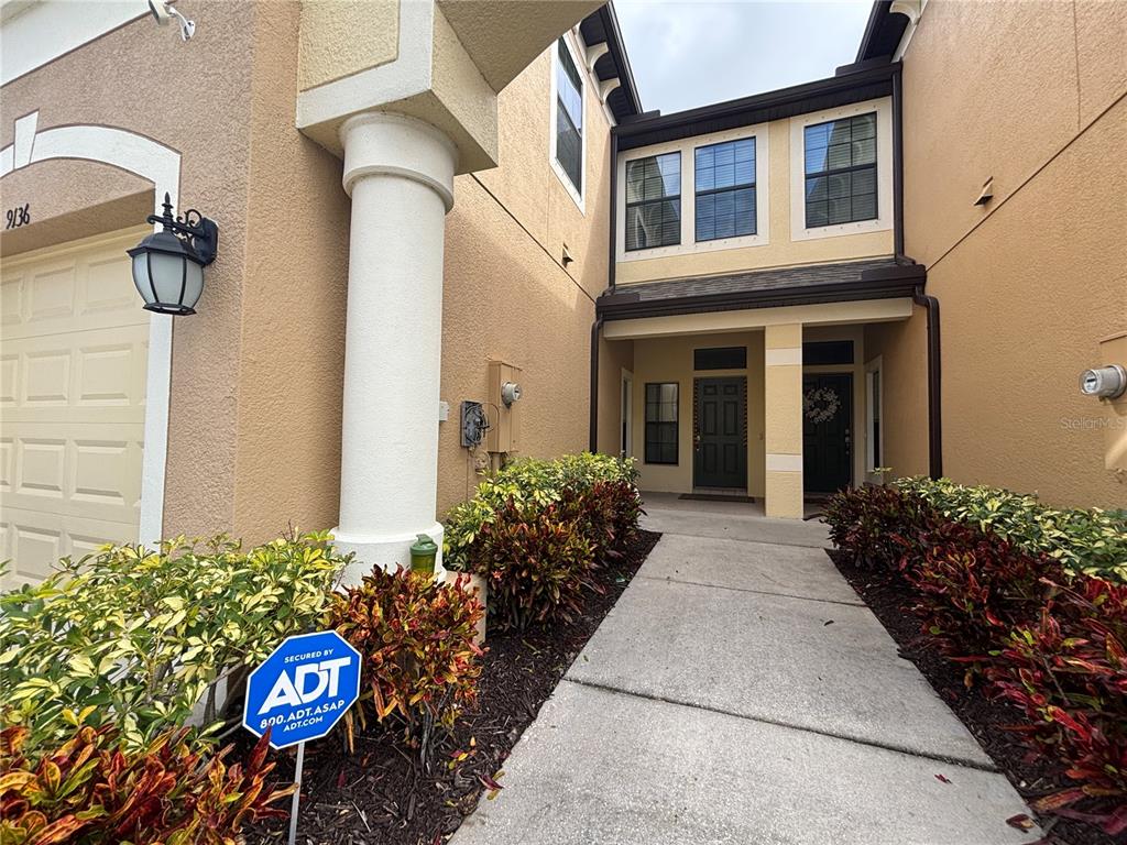 9136 Fox Sparrow Road Tampa, FL 33626 - Photo 3 of 34 a view of a front door of house