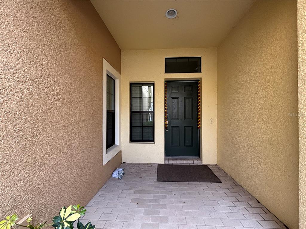 9136 Fox Sparrow Road Tampa, FL 33626 - Photo 4 of 34 a view of entrance door of the house