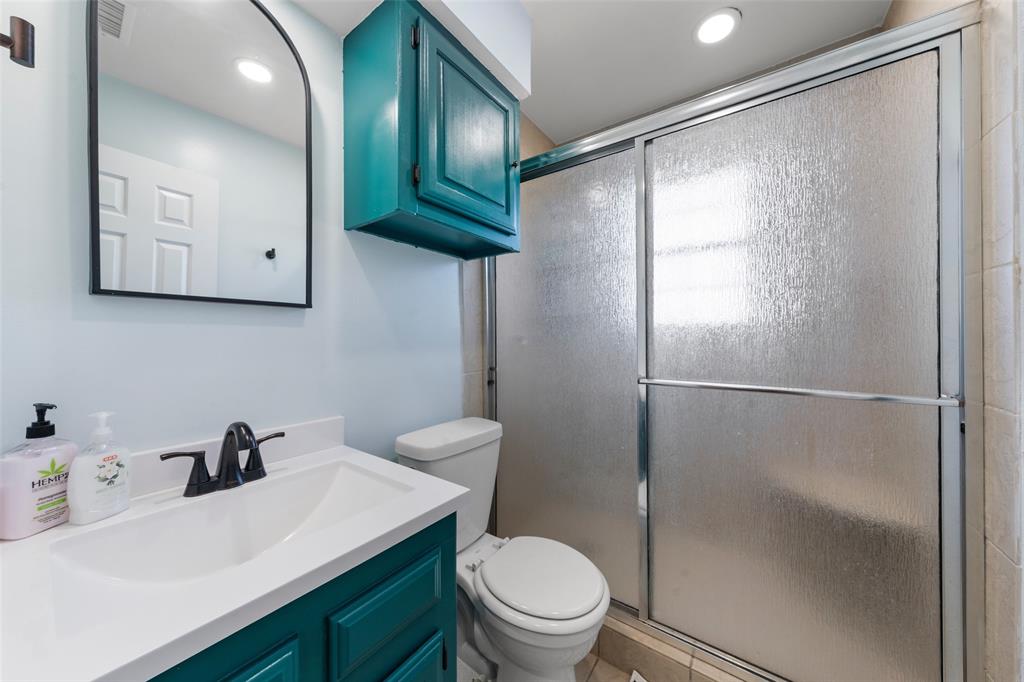 162 High Ridge Drive Bruceville, TX 76630 - Photo 24 of 40 a bathroom with a sink toilet and shower