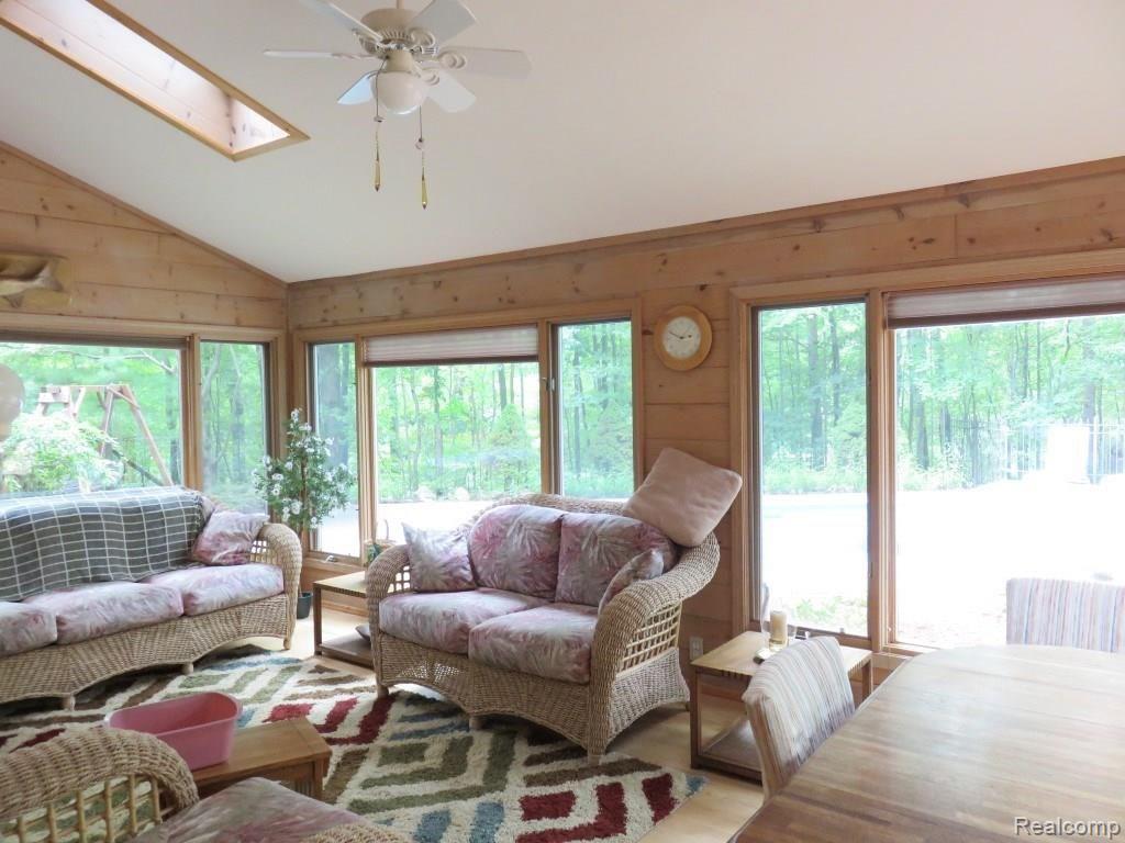 2673 Brighton Road Howell, MI 48843 - Photo 20 of 62 Bright & light sunroom