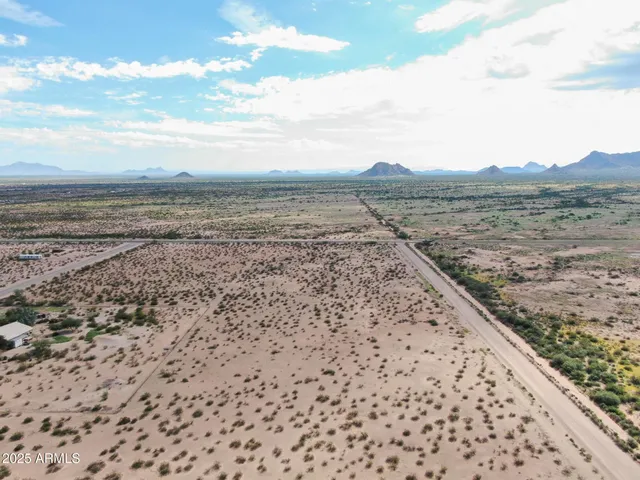 a view of a lake with mountain