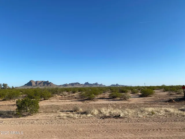 a view of lake with mountain