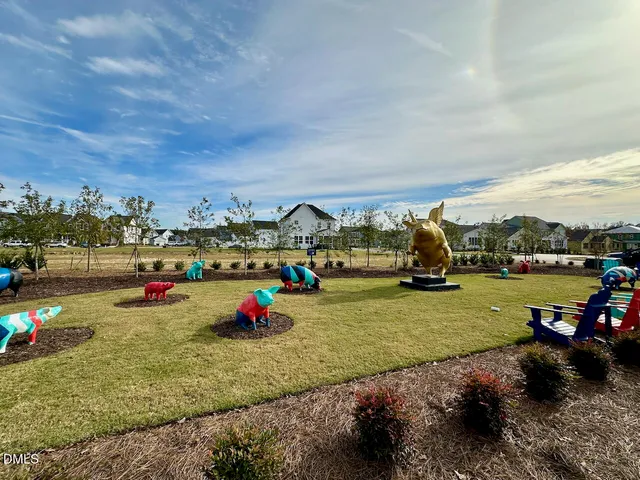 a view of a park with swings and slides