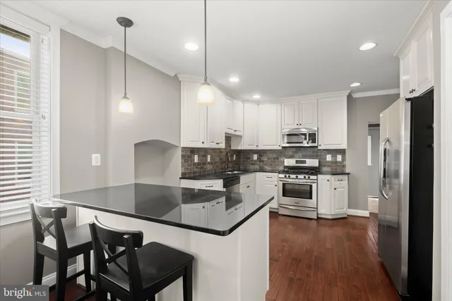 a view of a city with tall buildings