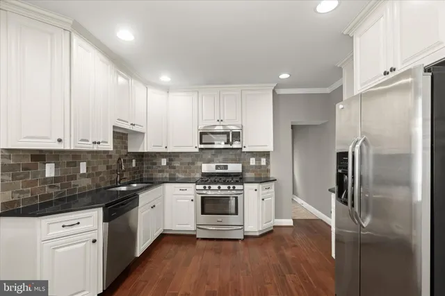 an aerial view of residential building with parking space