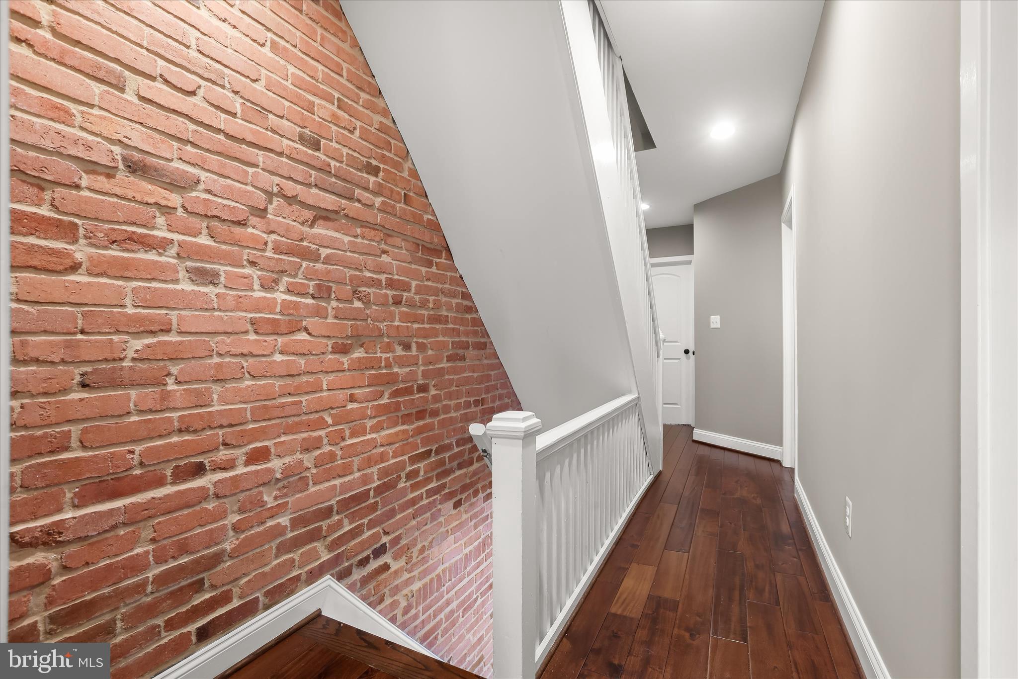 3000 Keswick Road Baltimore, MD 21211 - Photo 28 of 81 Upper Level Landing - Exposed Brick Walls
