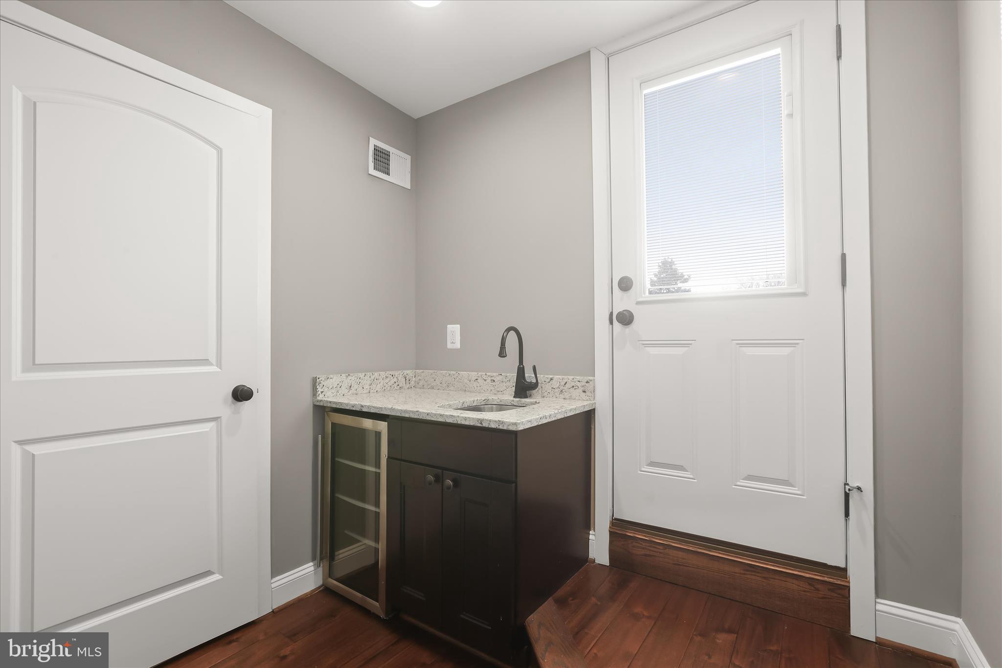 3000 Keswick Road Baltimore, MD 21211 - Photo 43 of 81 Wet Bar - Laundry Room - Rooftop Deck