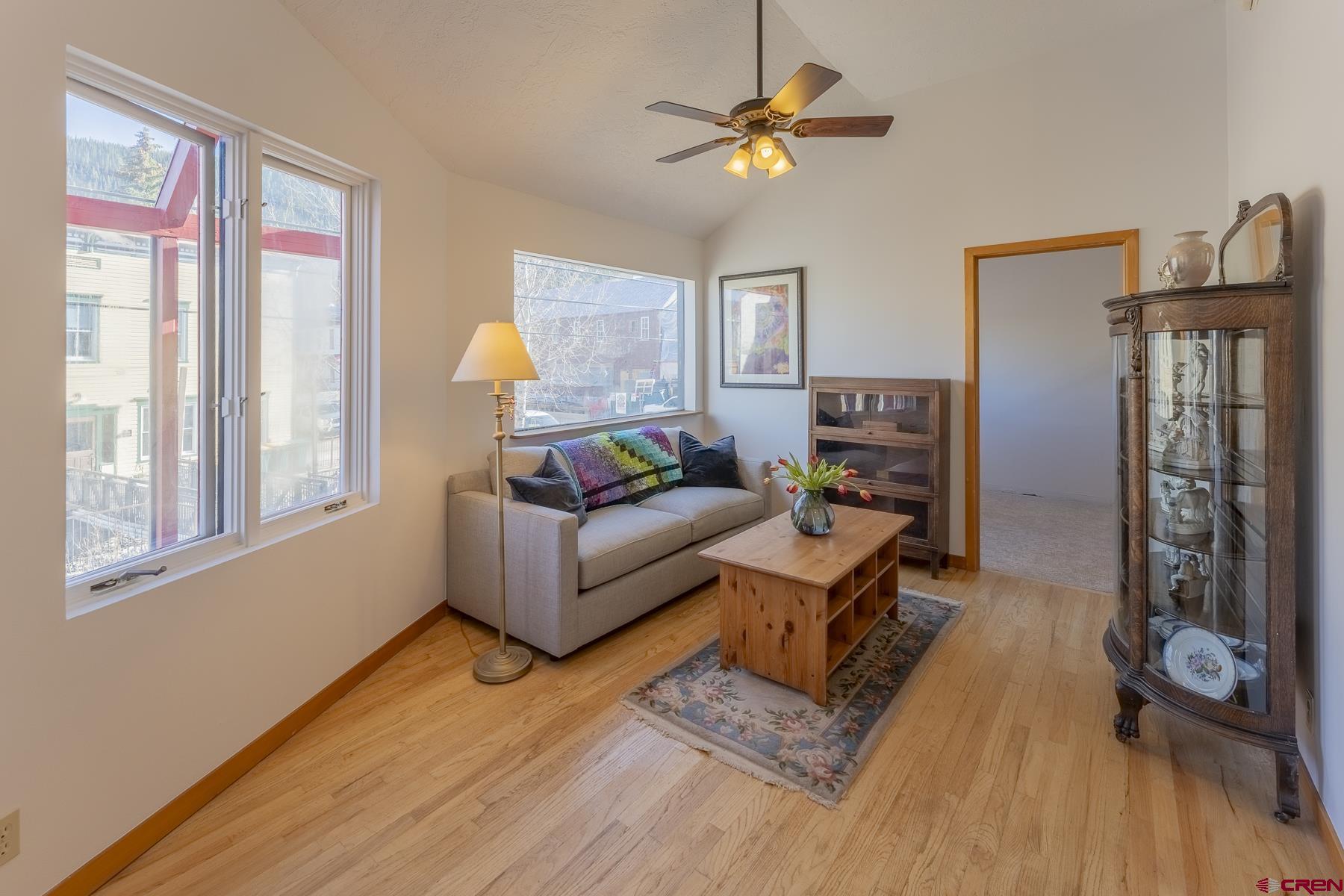 310 2nd Street Crested Butte, CO 81224 - Photo 17 of 42 a living room with furniture and a wooden floor