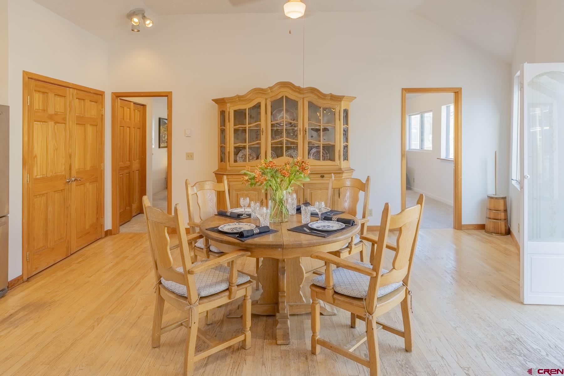 310 2nd Street Crested Butte, CO 81224 - Photo 18 of 42 a view of a dining room with furniture and wooden floor