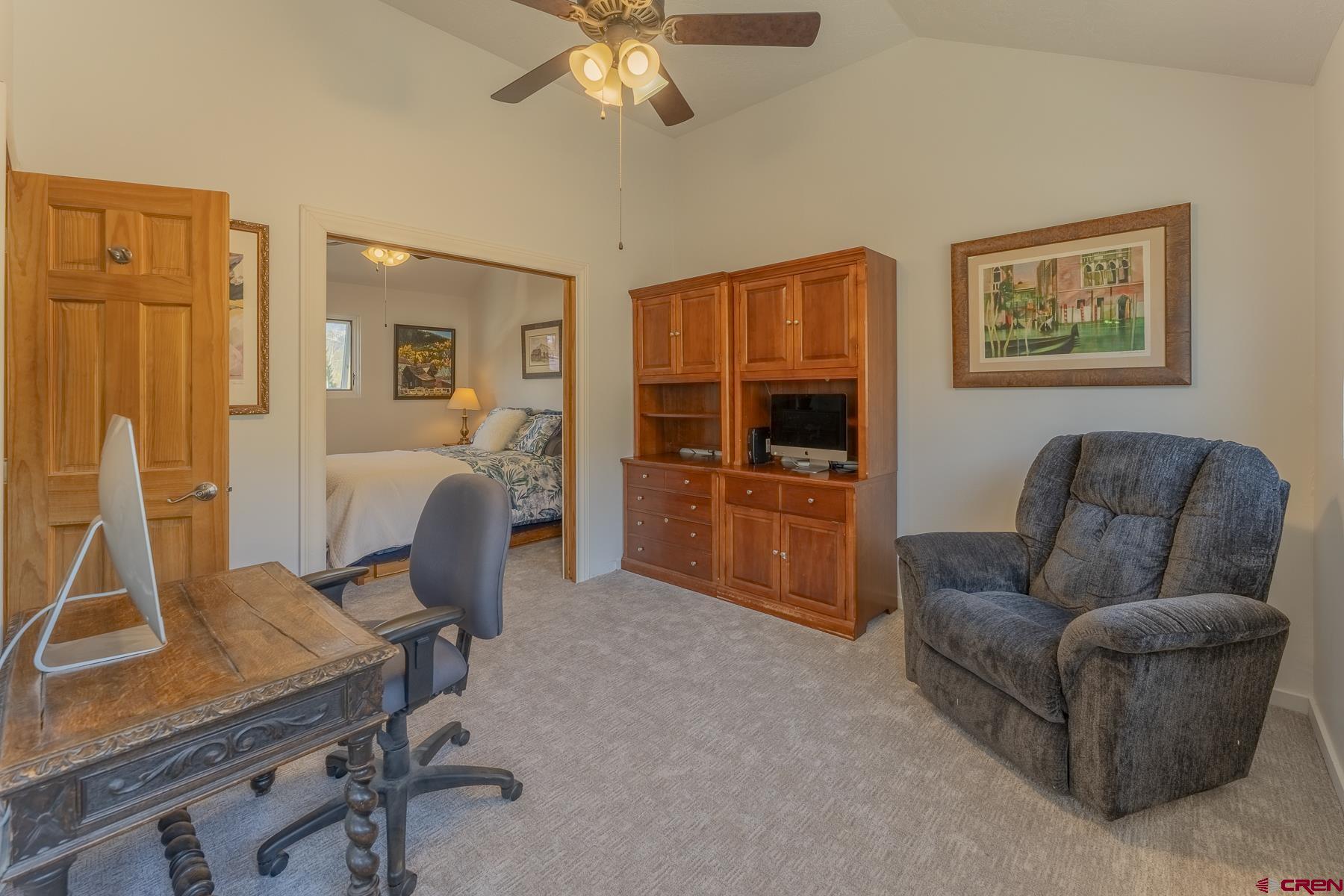 310 2nd Street Crested Butte, CO 81224 - Photo 23 of 42 a living room with furniture and a flat screen tv