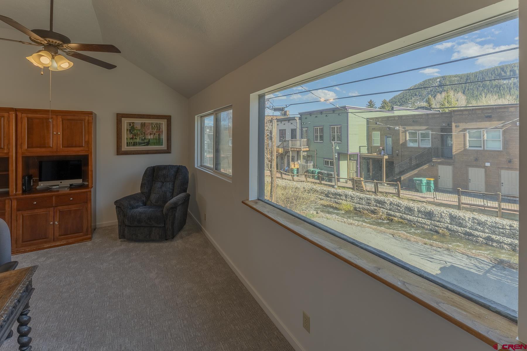 310 2nd Street Crested Butte, CO 81224 - Photo 25 of 42 a living room with furniture and a flat screen tv