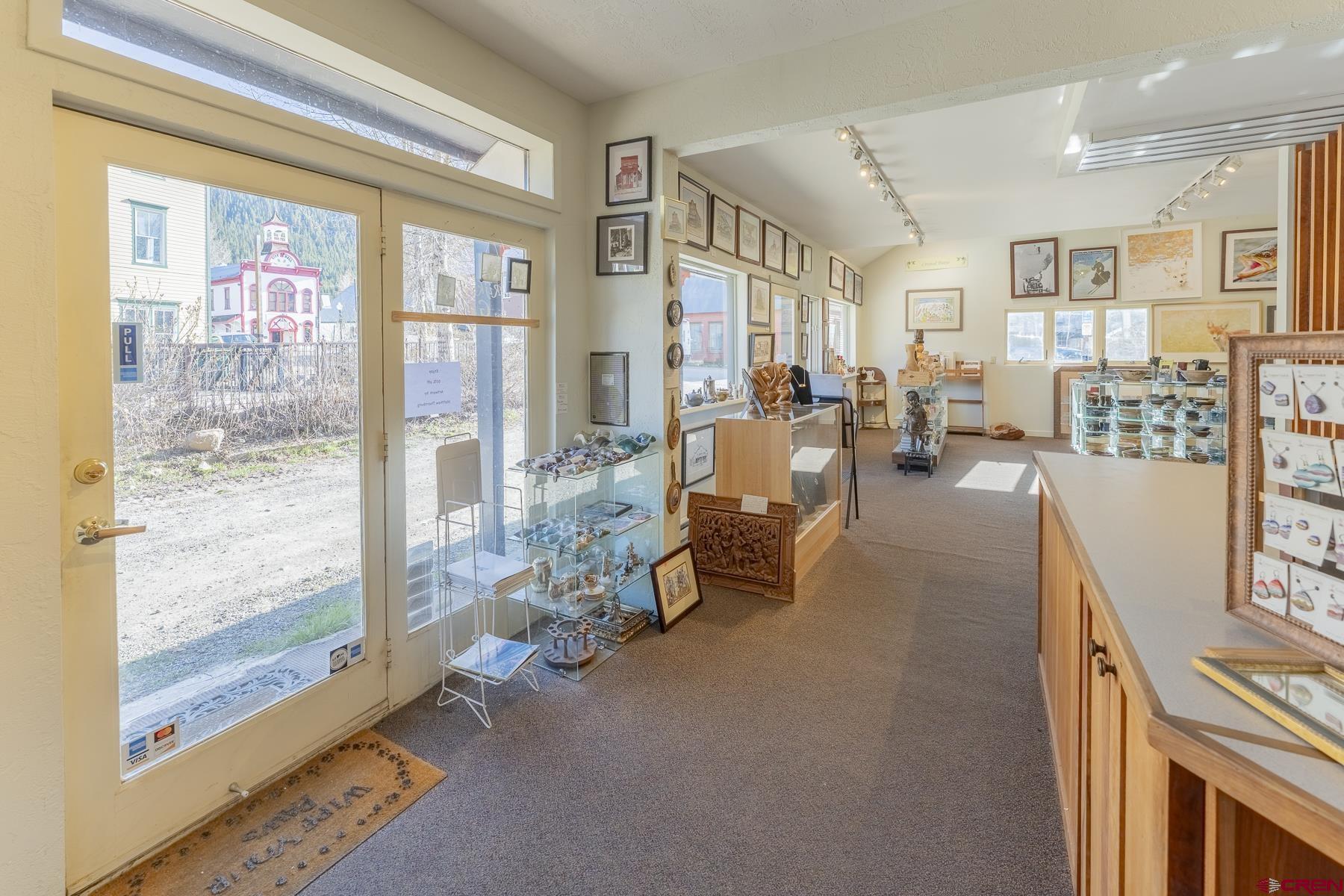 310 2nd Street Crested Butte, CO 81224 - Photo 31 of 42 a living room with furniture and a floor to ceiling window