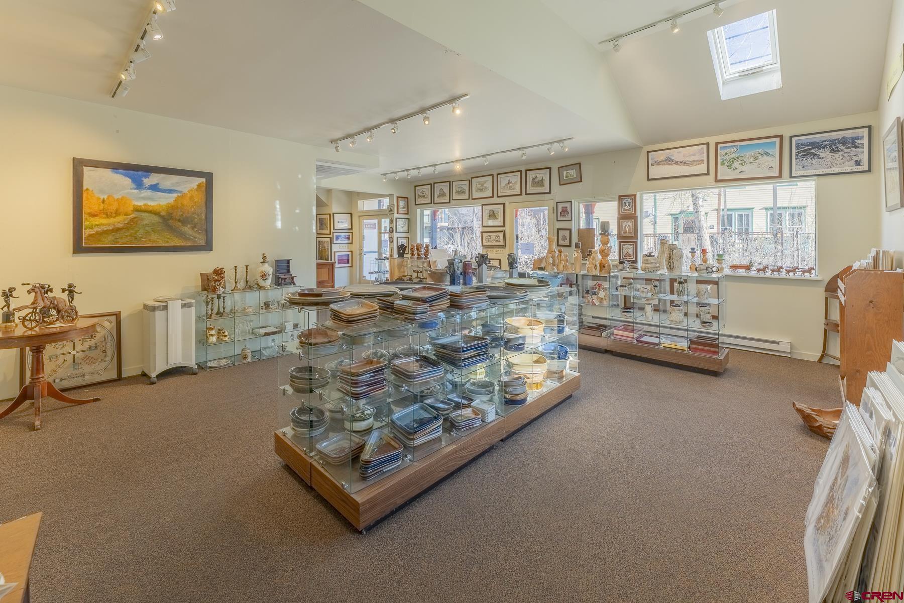 310 2nd Street Crested Butte, CO 81224 - Photo 33 of 42 a living room with lots of furniture and a large window