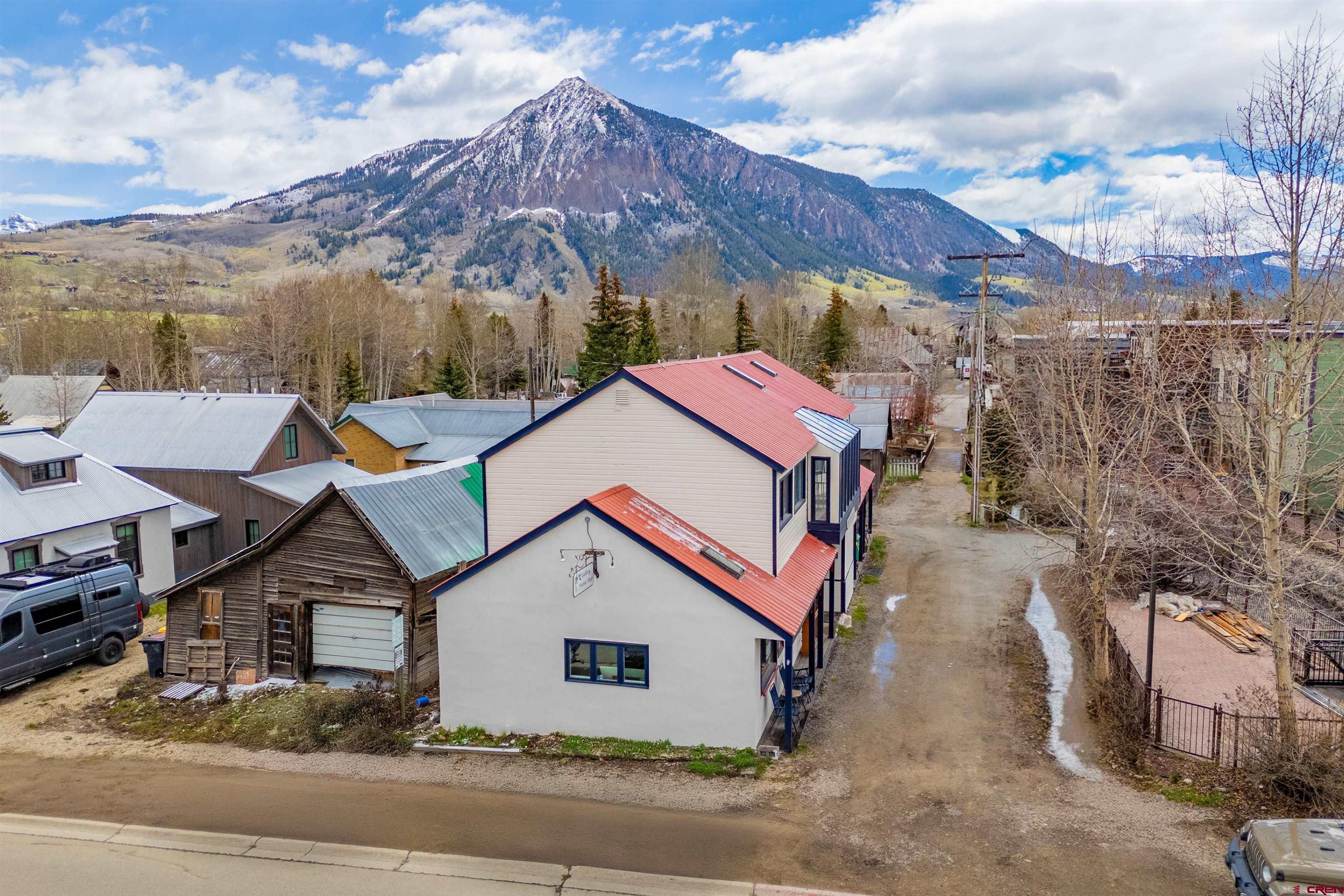 310 2nd Street Crested Butte, CO 81224 - Photo 42 of 42 a aerial view of a house next to a yard