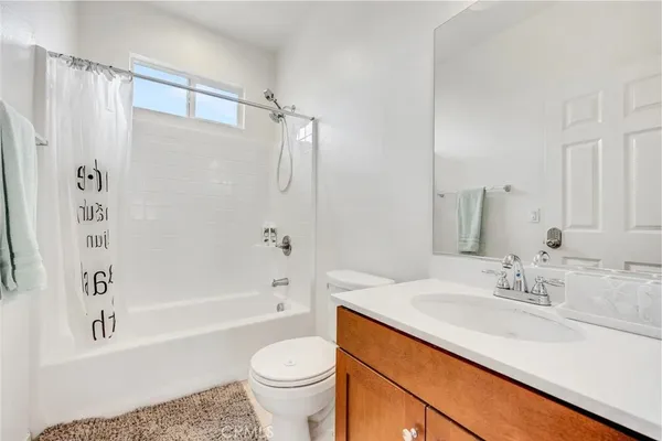 a view of a backyard with swimming pool