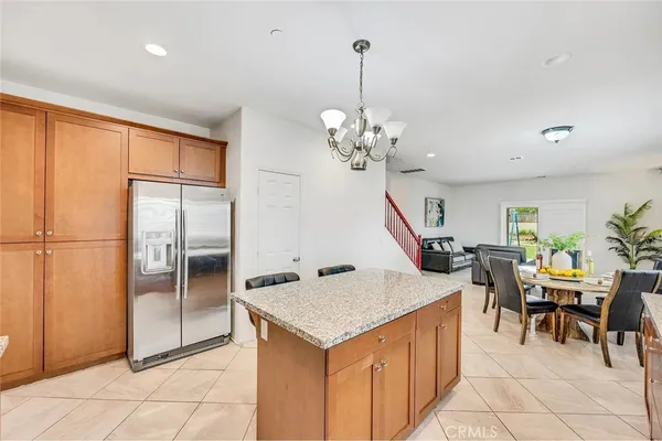 a very nice looking dining room with a table and chairs