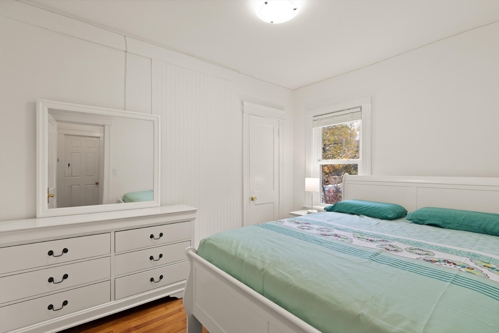 10 Minthorne Street Worcester, MA 01603 - Photo 19 of 29 a bedroom with a bed and a dresser