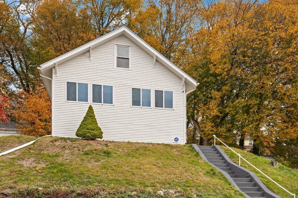 10 Minthorne Street Worcester, MA 01603 - Photo 2 of 29 a view of a house with a backyard