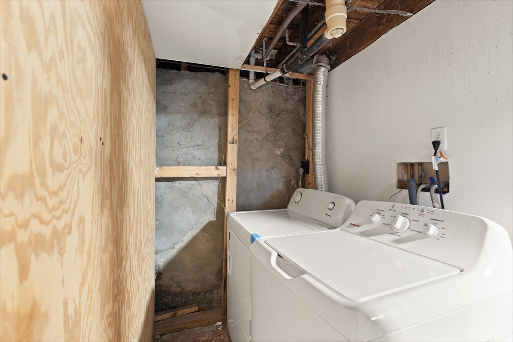 10 Minthorne Street Worcester, MA 01603 - Photo 27 of 29 a bathroom with a sink toilet and shower