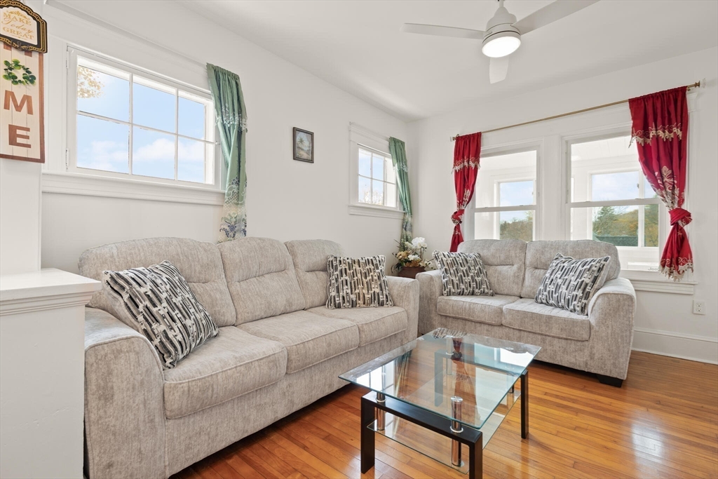 10 Minthorne Street Worcester, MA 01603 - Photo 9 of 29 a living room with furniture and a large window