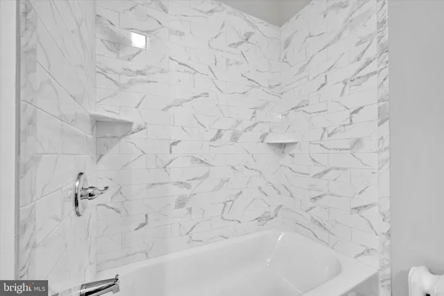 a bathroom with a bathtub