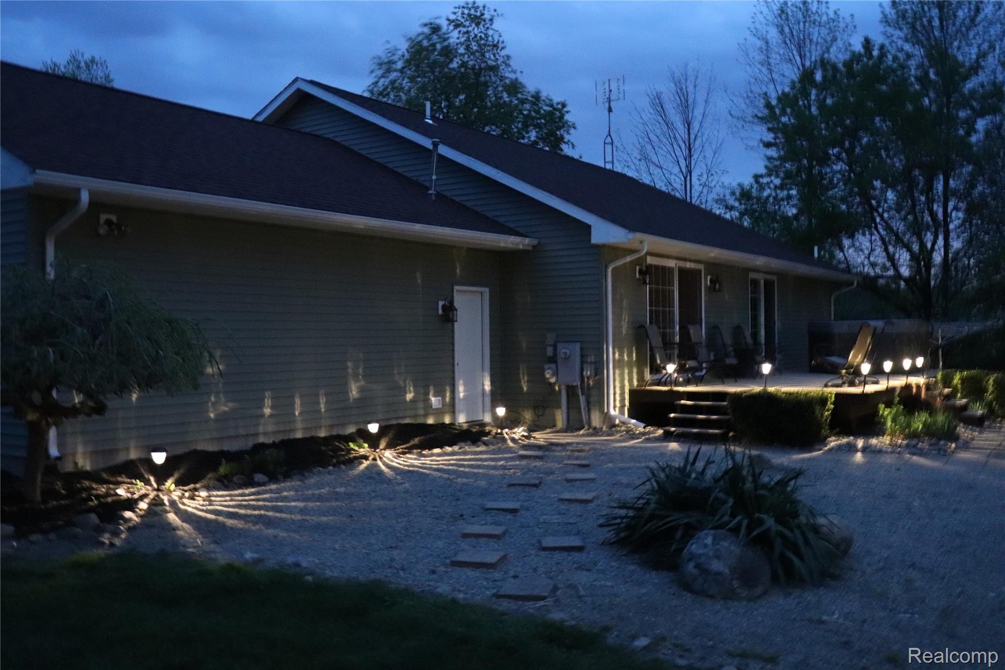 1853 Mitchell Lake Road Attica, MI 48412 - Photo 6 of 40 Dusk Rear View
