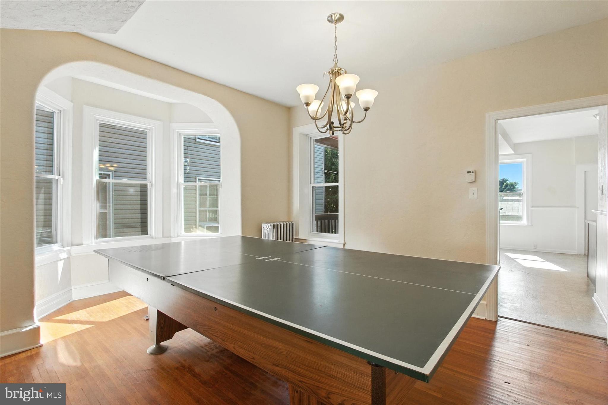 46 North Main Street Spring Grove, PA 17362 - Photo 11 of 25 a view of a dining room with furniture wooden floor and chandelier