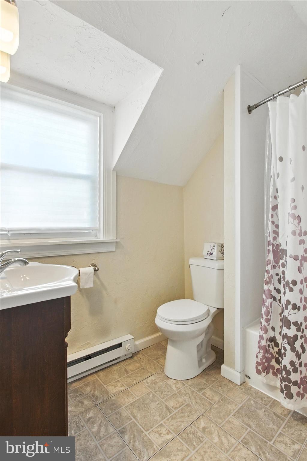 46 North Main Street Spring Grove, PA 17362 - Photo 18 of 25 a bathroom with a sink toilet and shower