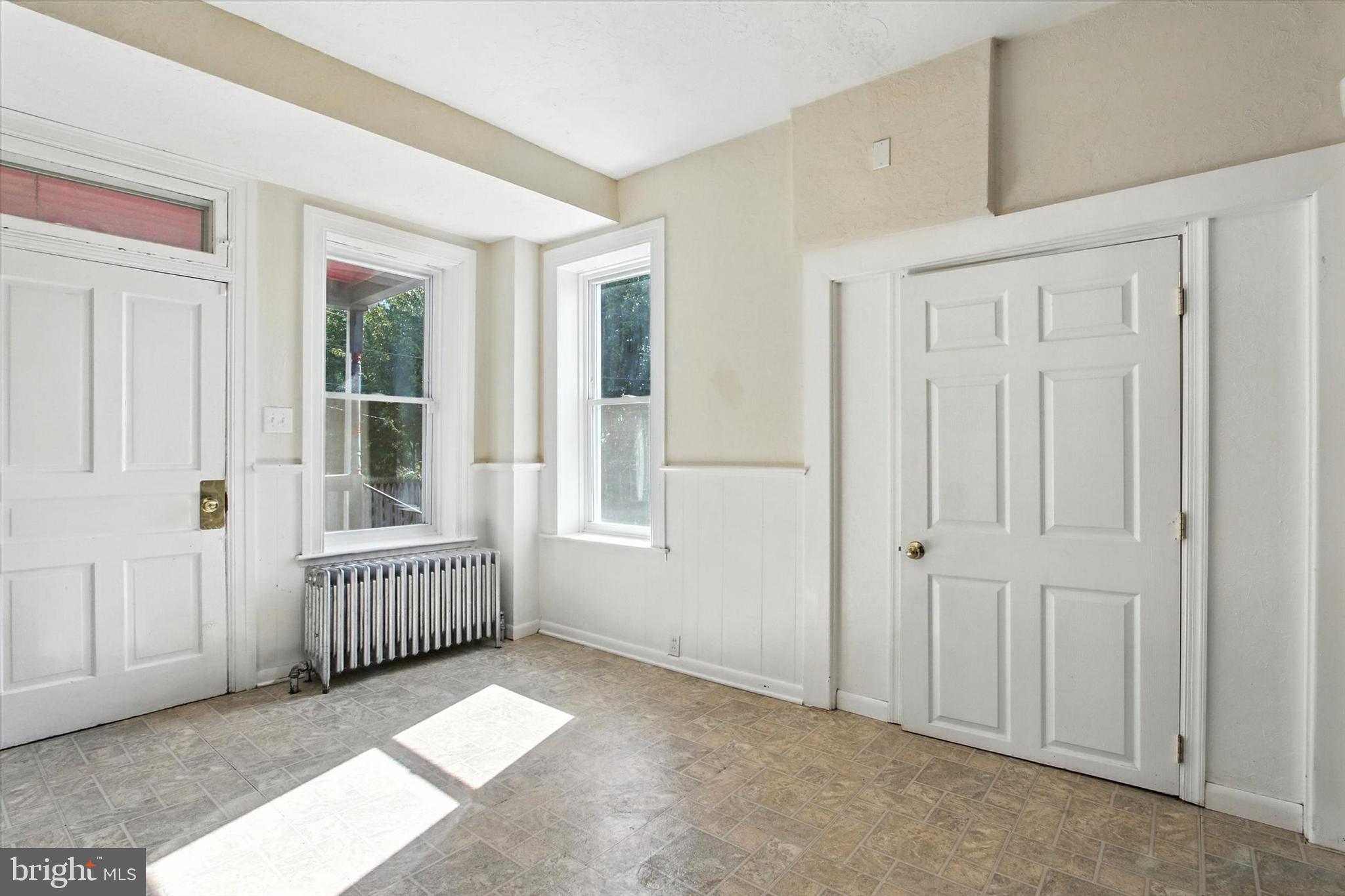 46 North Main Street Spring Grove, PA 17362 - Photo 8 of 25 an empty room with windows