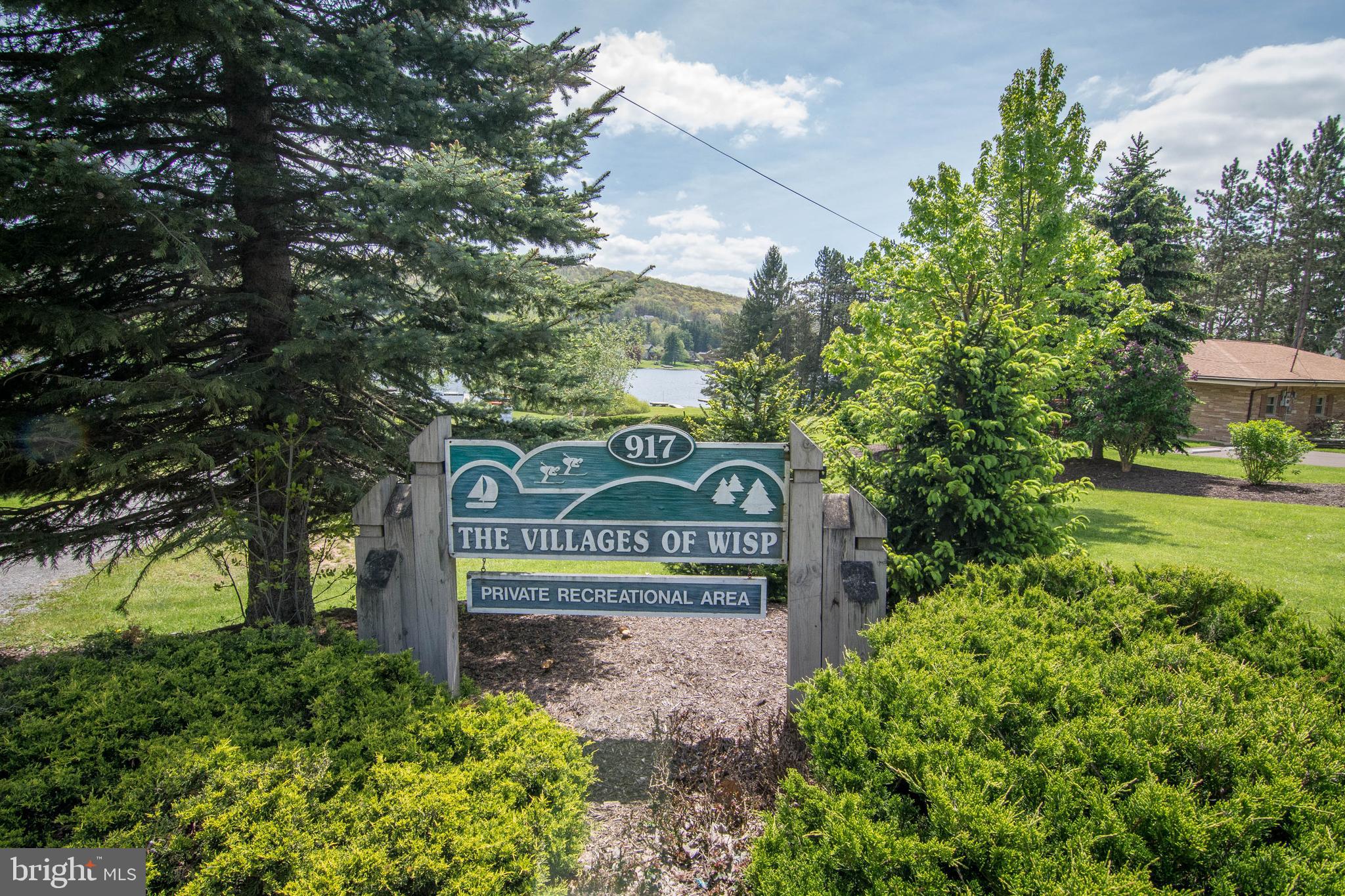 48 Bright Passage, Unit 5B McHenry, MD 21541 - Photo 36 of 56 a sign that is on a pole