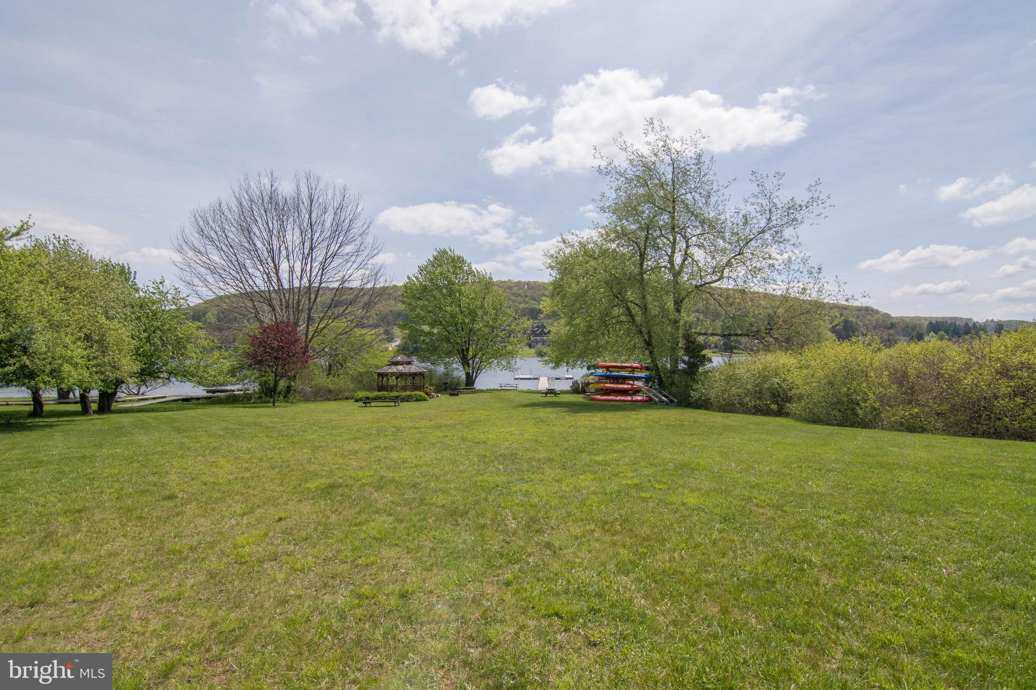 48 Bright Passage, Unit 5B McHenry, MD 21541 - Photo 45 of 56 a backyard of a house with lots of green space