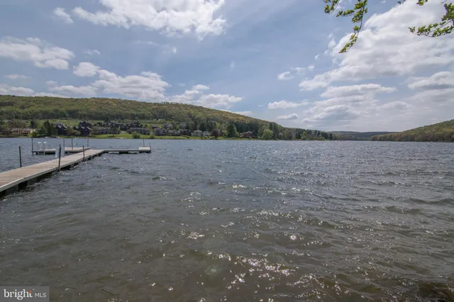 a view of a street with a yard
