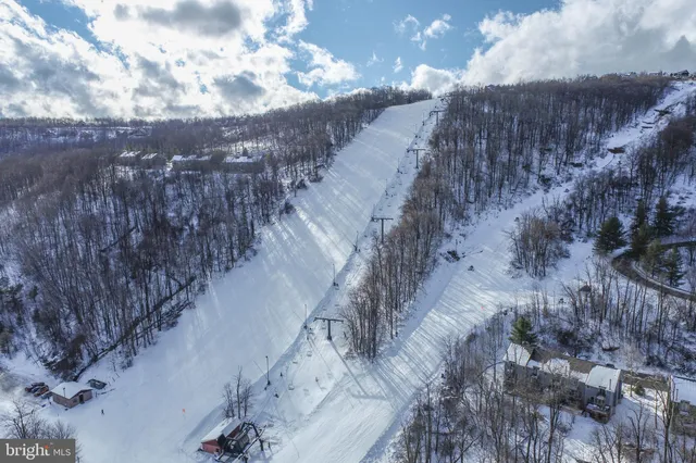 a view of a balcony with furniture