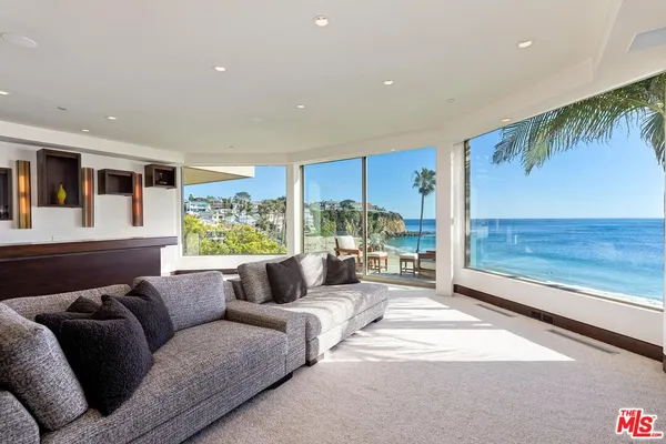 a large living room with a large window