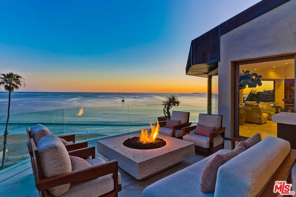 a view of a ocean from a furniture