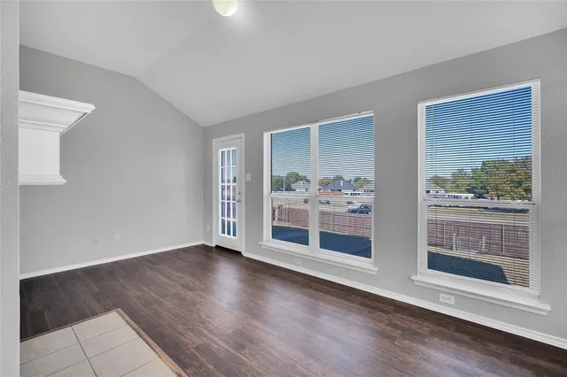 a view of a livingroom with wooden floor