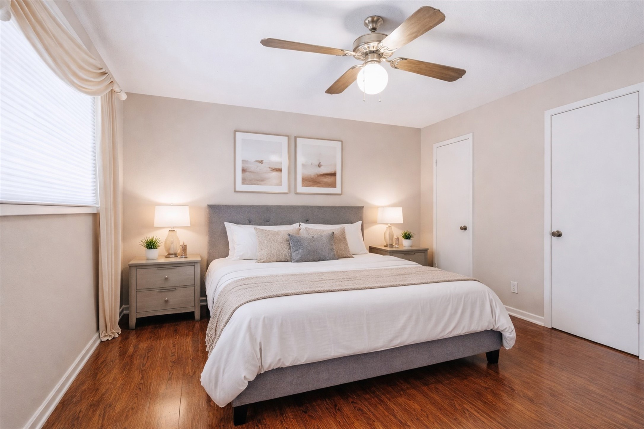 17011 Kings Walk Lane Houston, TX 77070 - Photo 14 of 50 a bedroom with a bed chandelier and a window