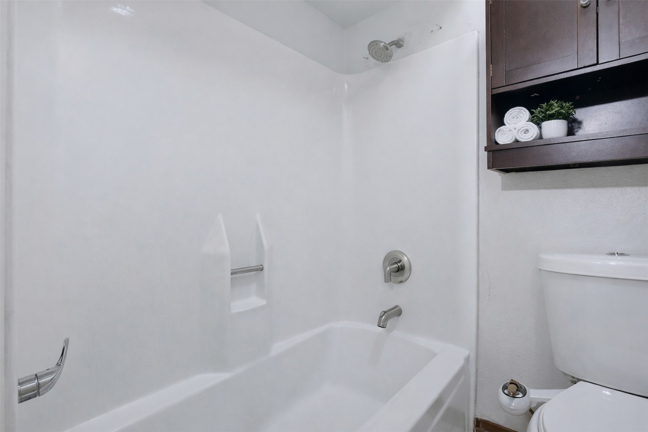 17011 Kings Walk Lane Houston, TX 77070 - Photo 20 of 50 a white bath tub sitting next to a white toilet and vanity