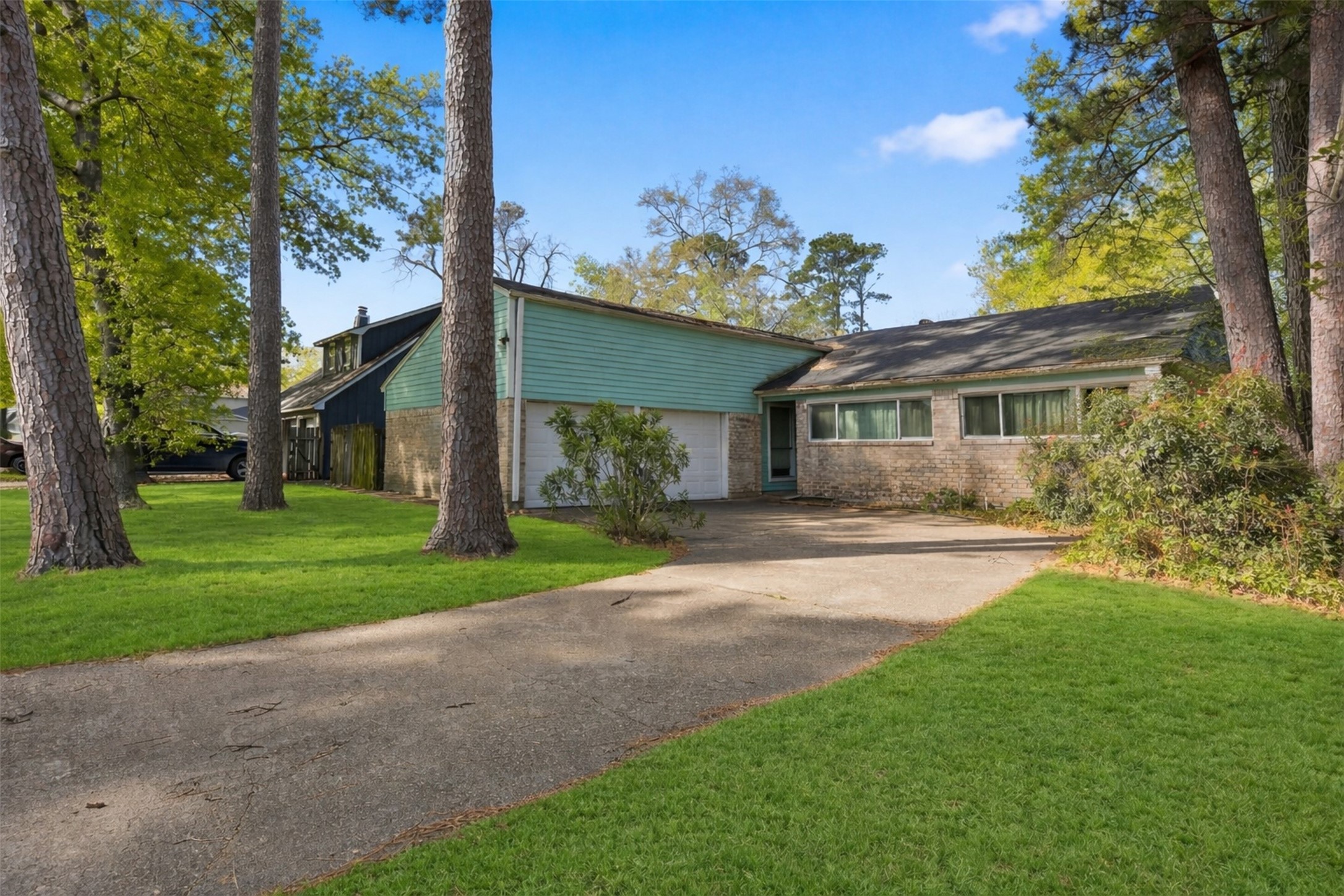 17011 Kings Walk Lane Houston, TX 77070 - Photo 2 of 50 a view of a yard in front of house