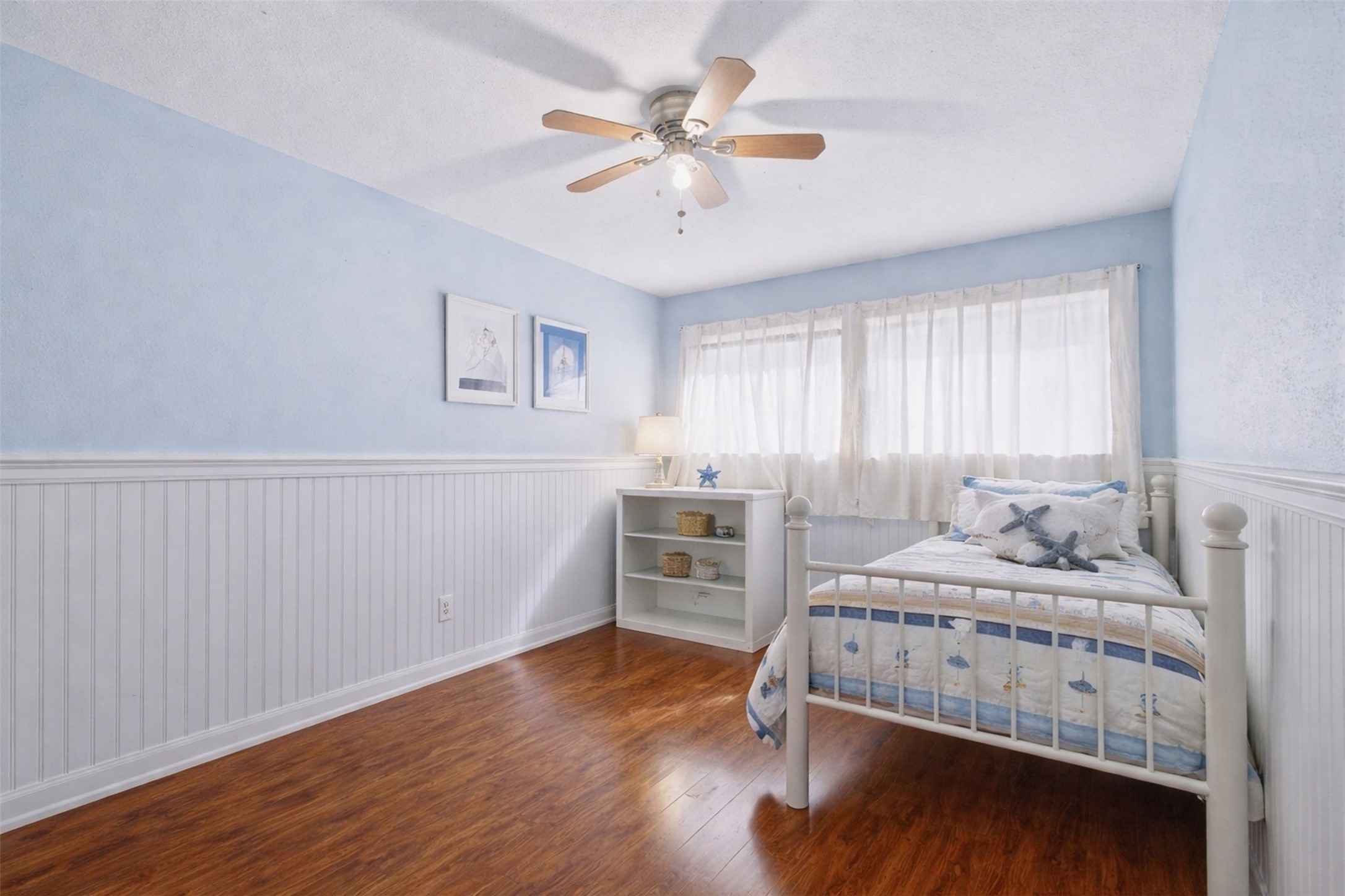 17011 Kings Walk Lane Houston, TX 77070 - Photo 22 of 50 a bedroom with a bed and a chandelier