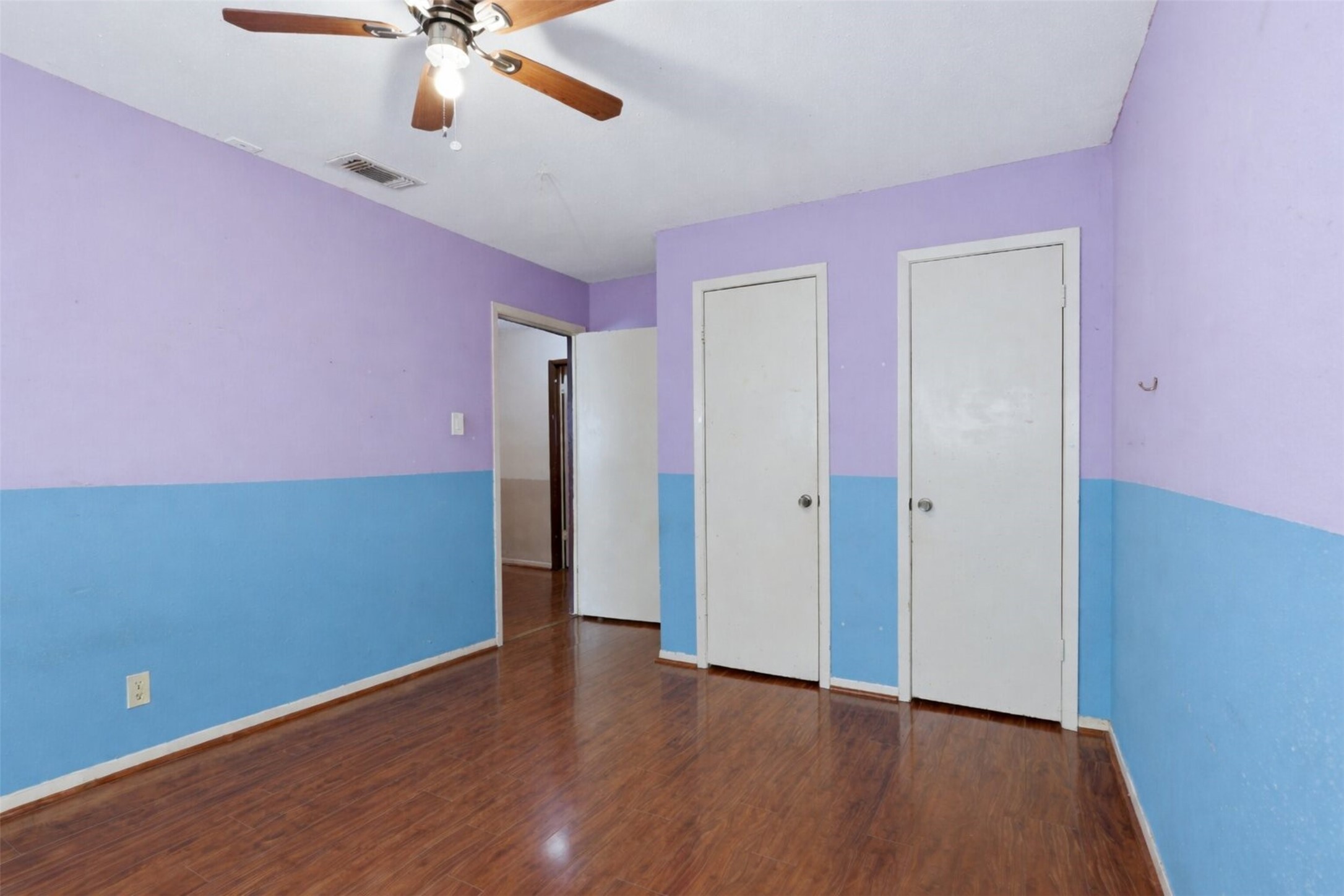 17011 Kings Walk Lane Houston, TX 77070 - Photo 27 of 50 Versatile bedroom with ceiling fan, closet space, and room for various furniture arrangements.