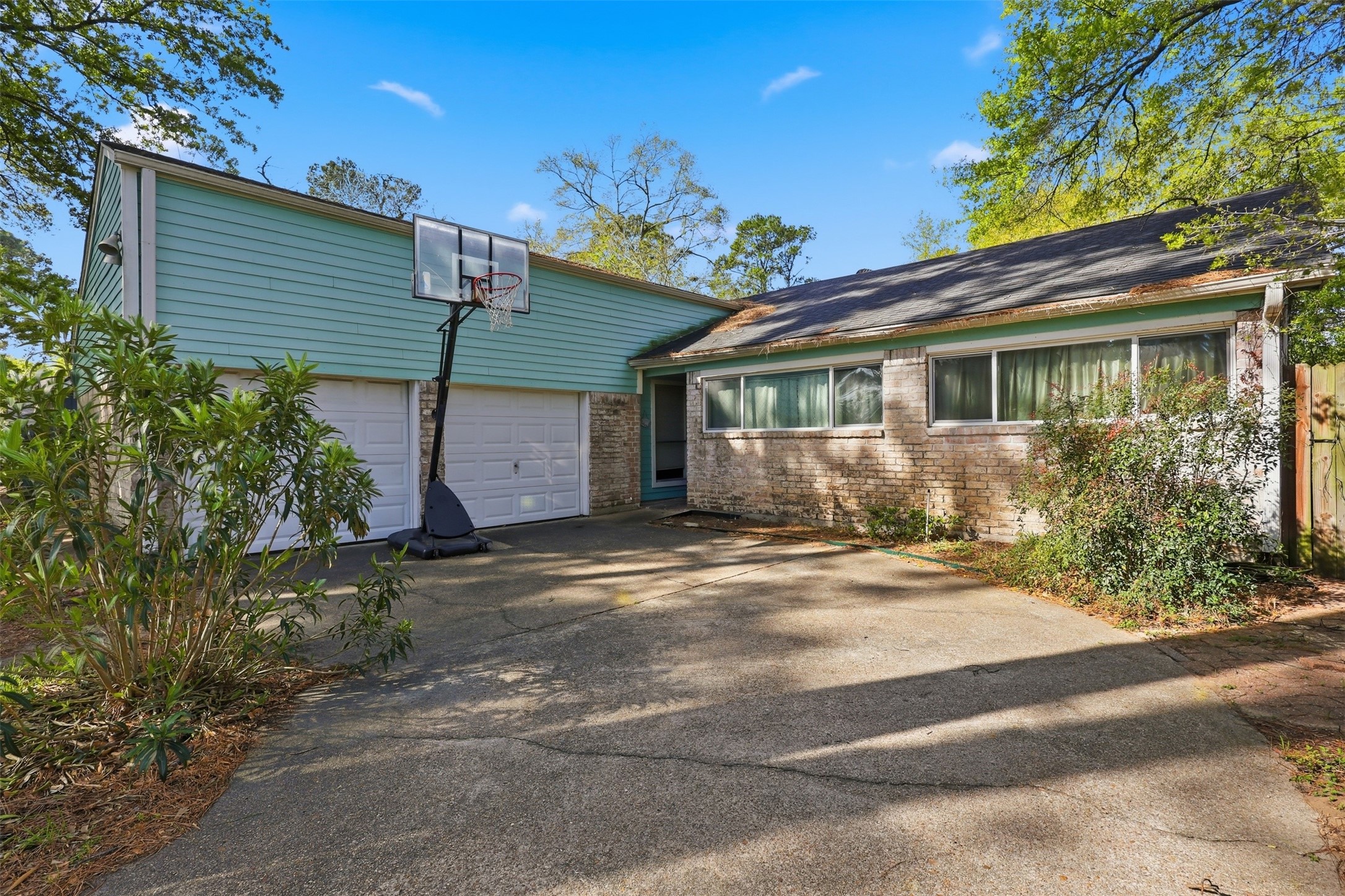 17011 Kings Walk Lane Houston, TX 77070 - Photo 37 of 50 a front view of a house with a yard and garage