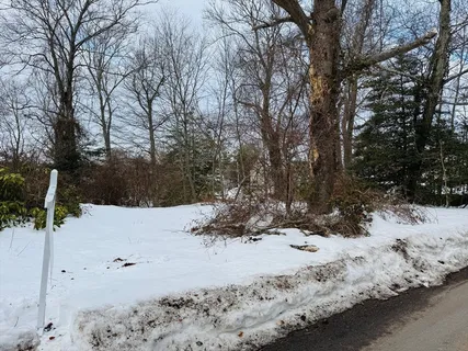 a view of a covered with snow in the yard