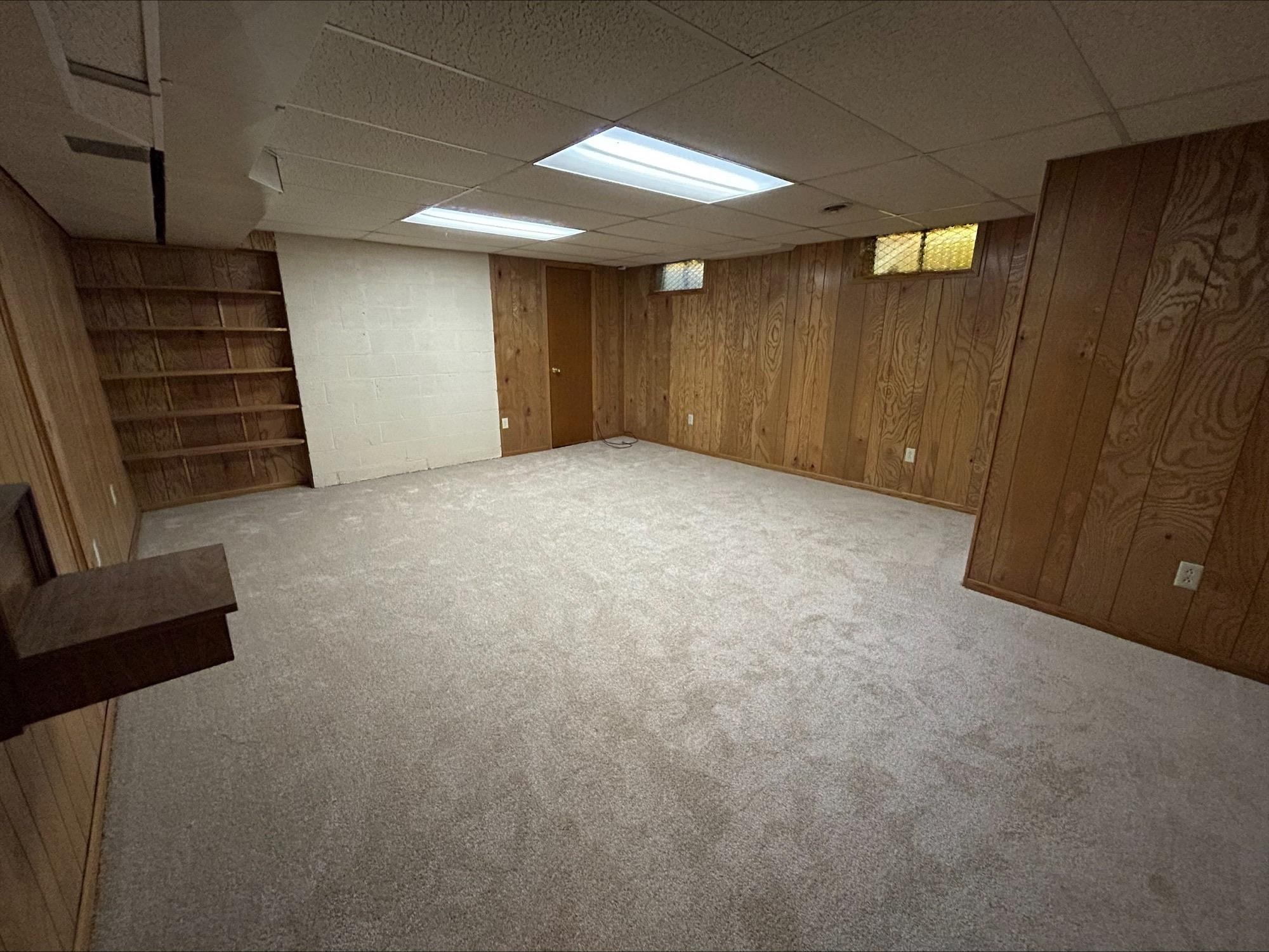 4003 Pinecrest Road Rockford, IL 61107 - Photo 15 of 16 a view of an empty room with stairs and ventilation