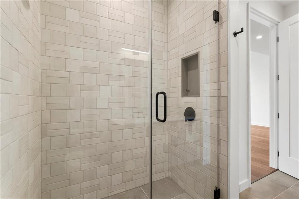84 East Avenue, Unit 1202 Austin, TX 78701 - Photo 15 of 39 a bathroom with a shower