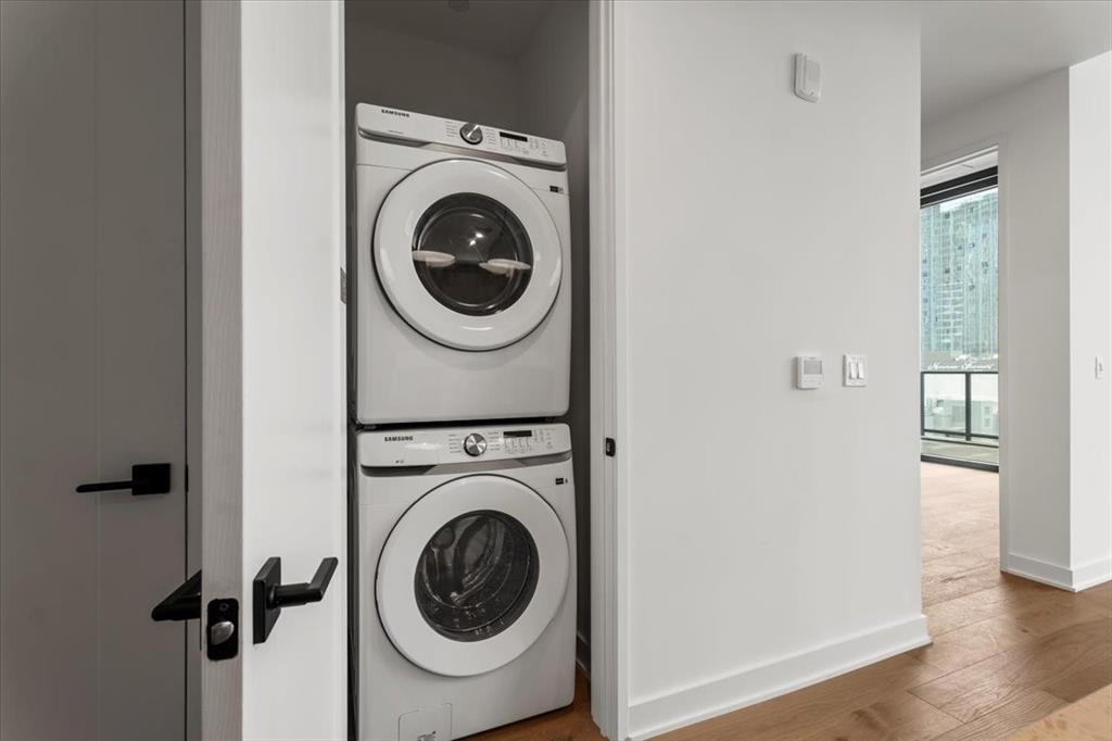 84 East Avenue, Unit 1202 Austin, TX 78701 - Photo 16 of 39 a utility room with dryer and washer