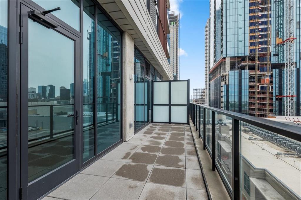 84 East Avenue, Unit 1202 Austin, TX 78701 - Photo 18 of 39 a view of balcony with wooden floor