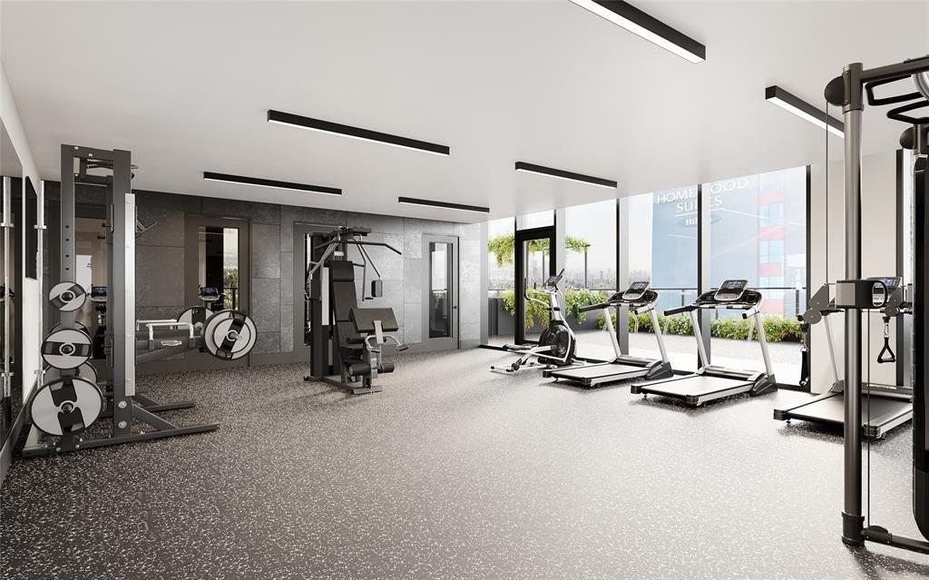 84 East Avenue, Unit 1202 Austin, TX 78701 - Photo 28 of 39 a view of a room with gym equipment