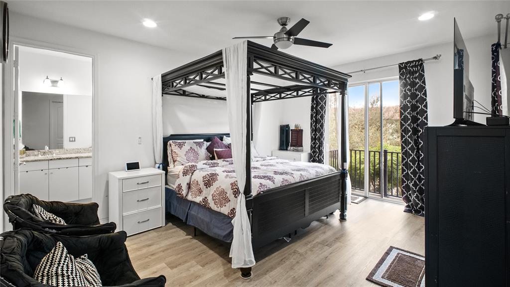 6993 Pines Circle, Unit 6993 Pompano Beach, FL 33073 - Photo 3 of 33 a bed room with a bed and furniture